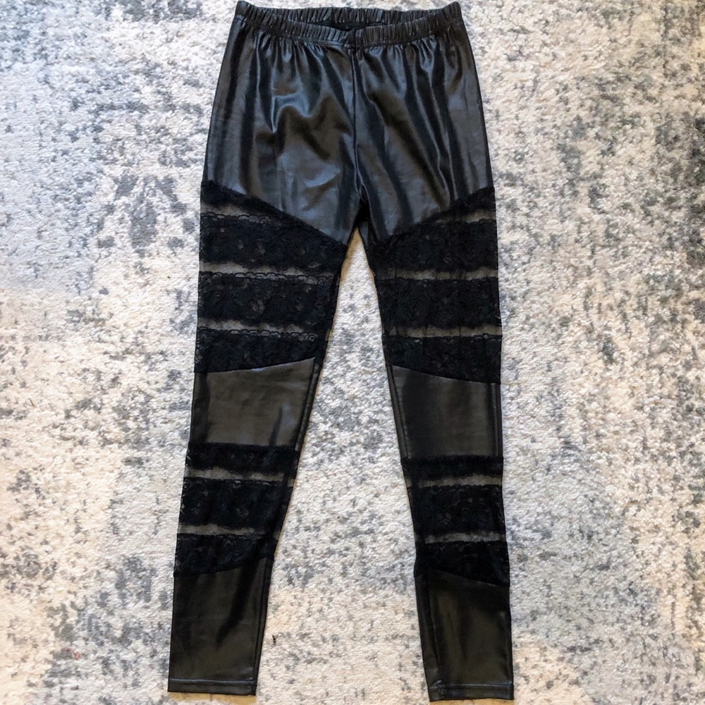 Black Leggings with floral lace blocks.